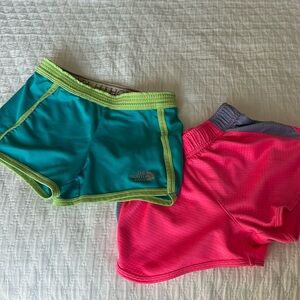 2 pairs of XS girls athletic shorts (The North Face and BCG)